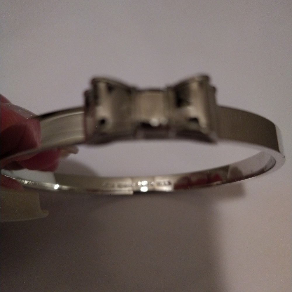 NWOT ♠️Kate Spade ♠️Silver Bow Bangle Bracelet - Picture 3 of 3